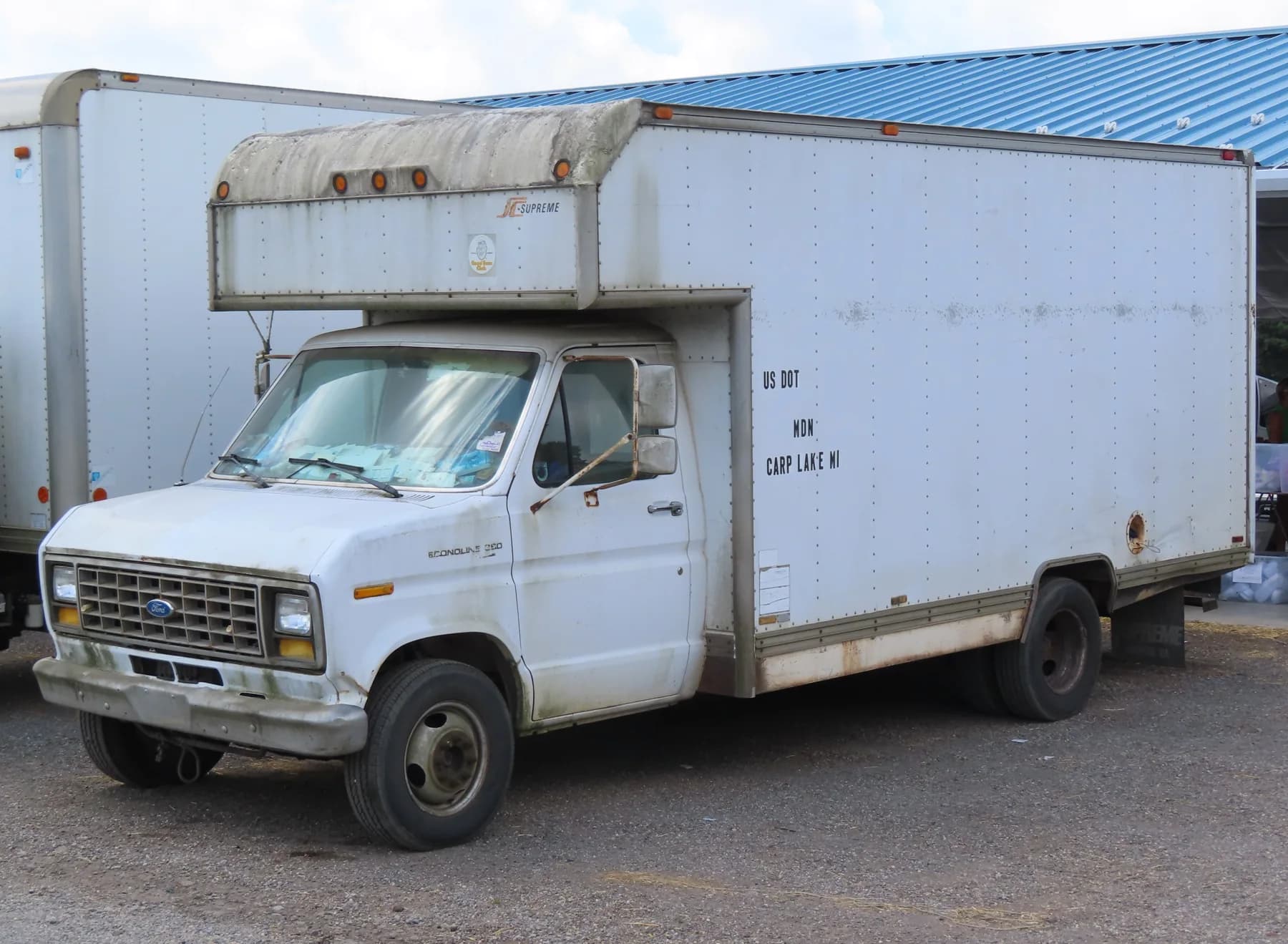 White Ford Econoline box truck photographed in Rogers, Ohio.