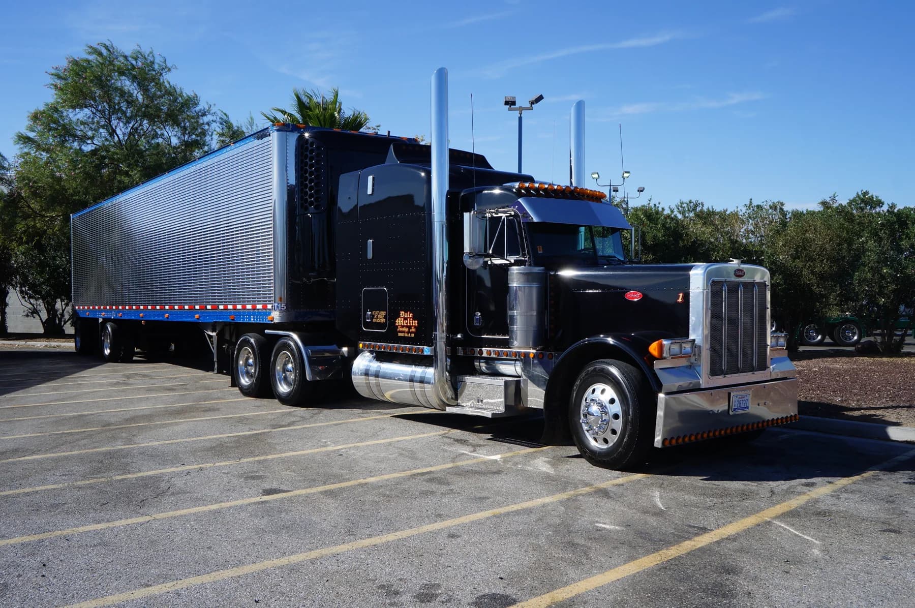 Peterbilt truck cab parked at a travel plaza in Bakersfield, California.