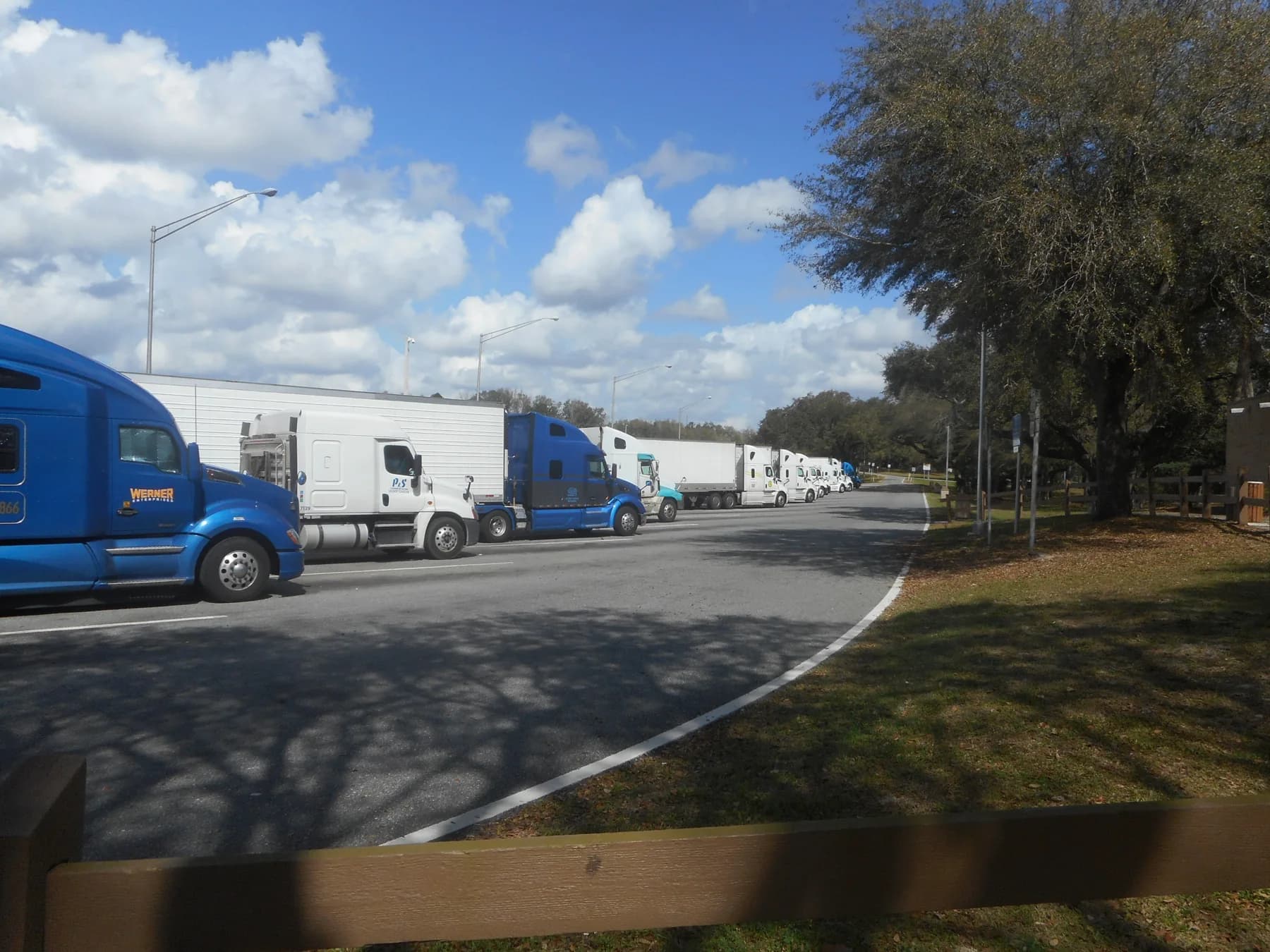 Commercial trucks parked at an Interstate 4 rest area in Florida.